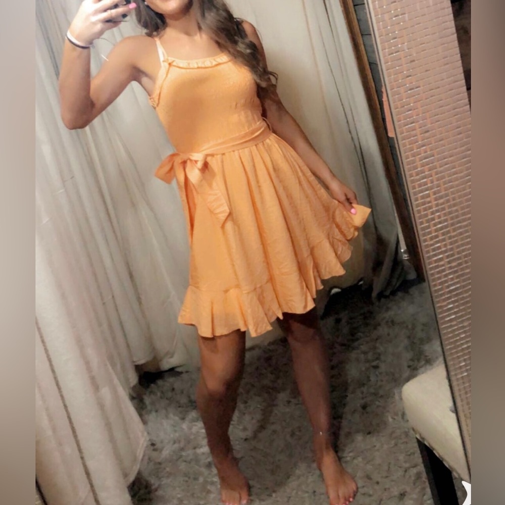 Boutique dress size small but can fit an XS like BRAND NEW